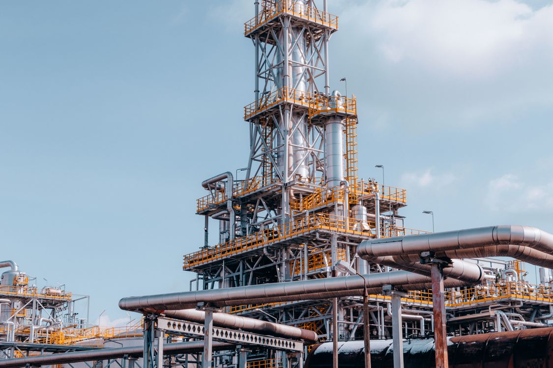 Stock photograph of a refinery and process plant, with towers and pipework